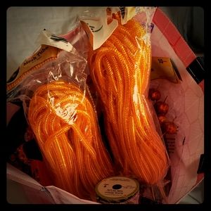 Bag full of craft supplies and some small decor